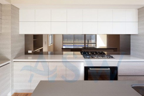 Custom made mirror toughened glass splashback